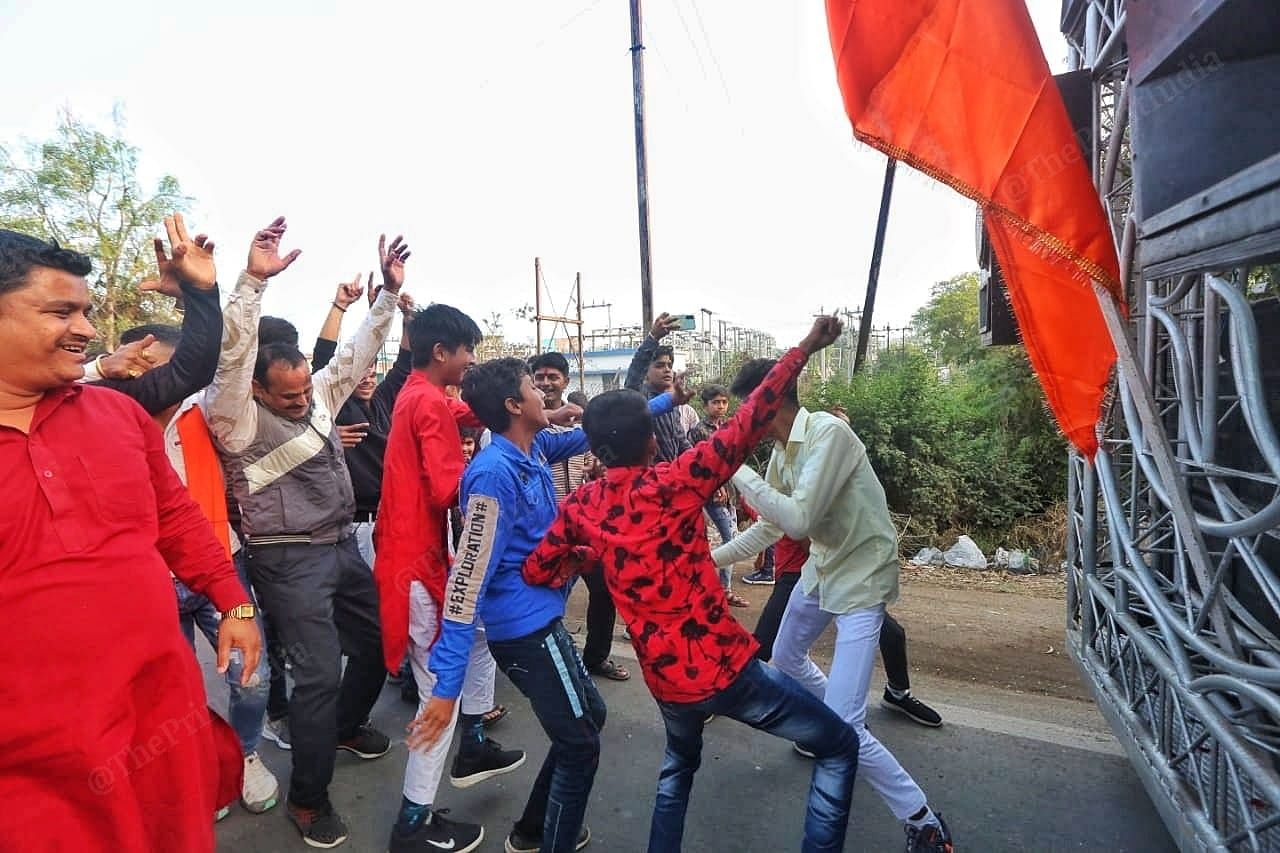 Children dancing in front of the vehicle | Photo: Praveen Jain | ThePrint