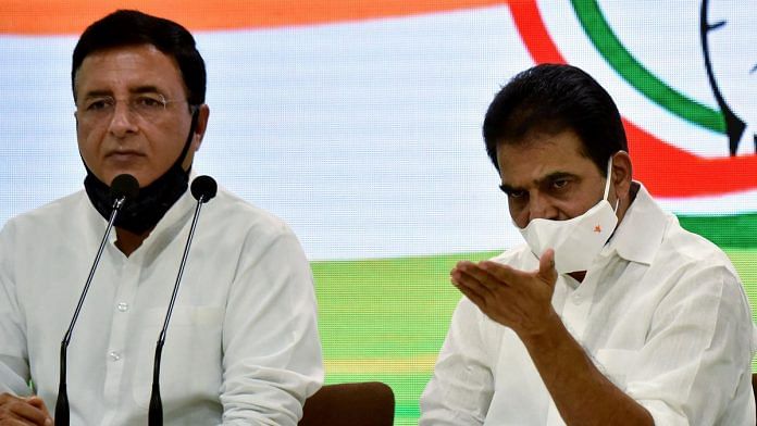 File image of Congress' chief spokesperson Randeep Surjewala (left) and general secretary K.C. Venugopal holding a press conference | Photo: ANI