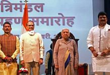 Newly-inducted ministers Tulsiram Silawat (left) and Govind Rajput (right) with Madhya Pradesh CM Shivraj Singh Chouhan and Governor Anandiben Patel Sunday | Photo: ANI