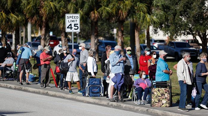 Senior citizens line up for vaccinations administered by Florida Health Department on 6 January 2021 | Bloomberg