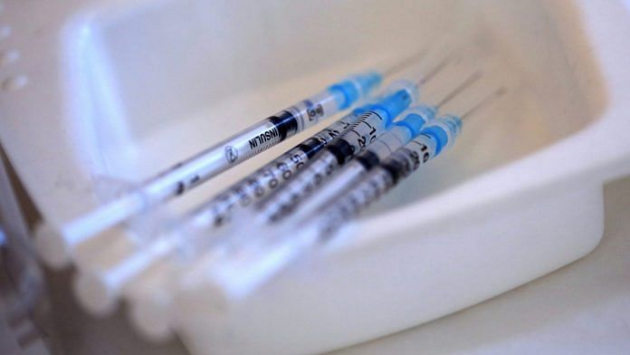 Syringes containing the Pfizer-BioNTech Covid-19 vaccine |Photographer: Oliver Bunic/Bloomberg