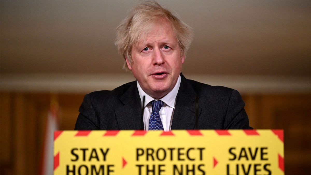 UK Prime Minister Boris Johnson speaks during a coronavirus press conference at 10 Downing Street on January 22, 2021 in London, England. | Photo by Leon Neal | Getty Images via Bloomberg