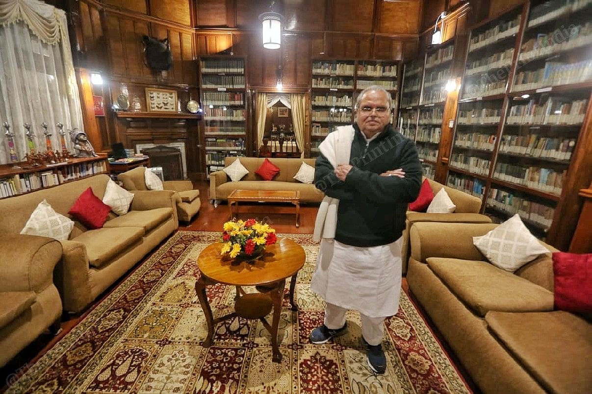 Governor of Meghalaya Satya Pal Malik standing at his library at his Residence| Photo: Praveen Jain | ThePrint