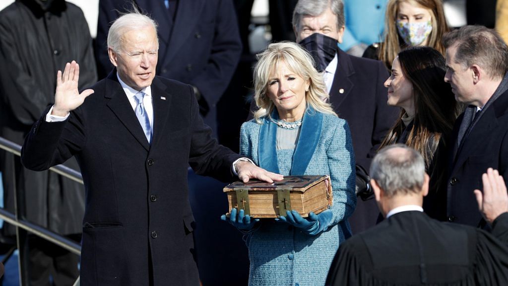 Joe Biden takes oath as the US president during the inauguration ceremony in Washington, DC, on 20 January | Photo: Daniel Acker | Bloomberg