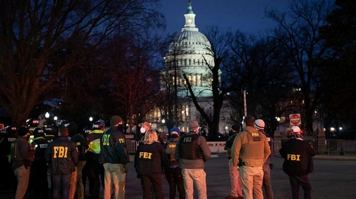 FBI agents arrive at Capitol Hill in Washington, D.C on 6 January | Image via Bloomberg