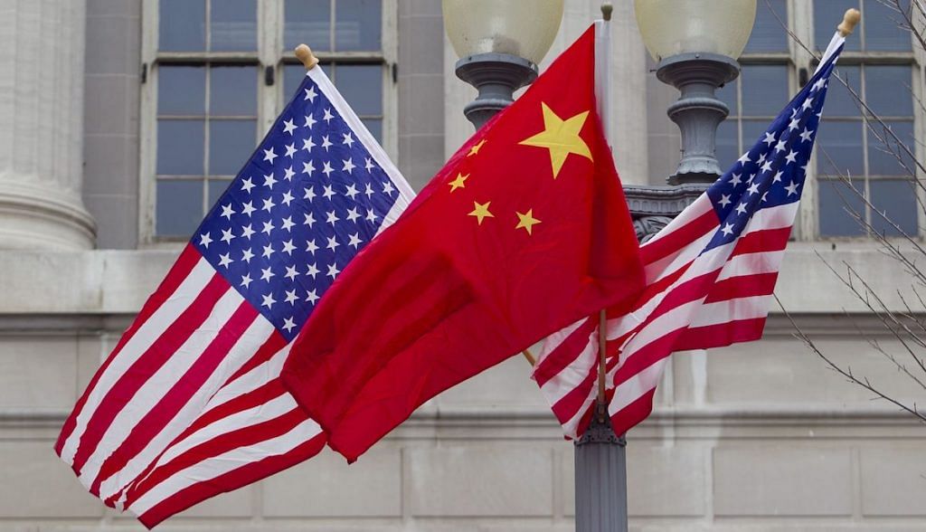 File photo | Flags of the US and China fly along Pennsylvania Avenue in Washington | D.C Andrew Harrer/Bloomberg
