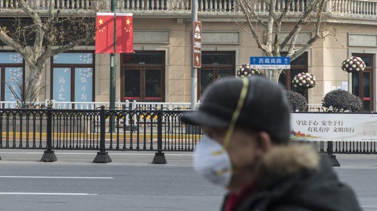 China denies entry to 2 WHO members who tested positive for Covid antibodies