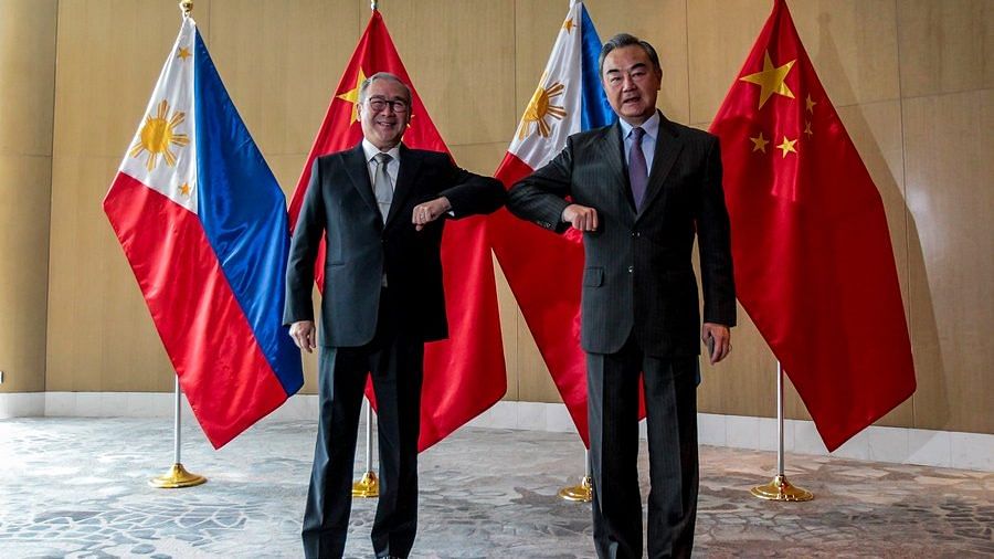 Chinese Foreign Minister Wang Yi with Filipino counterpart Teodoro Locsin in Manila on 16 January, 2021 | Twitter/@ChinaObserver