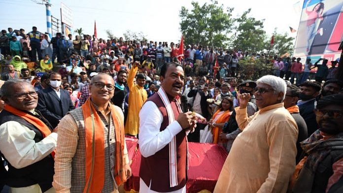 Uttar Pradesh Deputy Chief Minister Keshav Prasad amid Matua community people