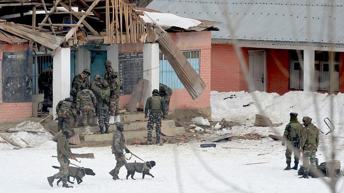 Security personnel inspect the area after a militant attack at Shamsipora in Kulgam district of South Kashmir | PTI Photo