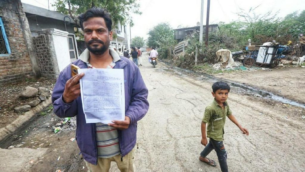Dorana resident Mohammed Umer Mansoori displays a letter he has written to the Mandsaur SP | Photo: Praveen Jain | ThePrint