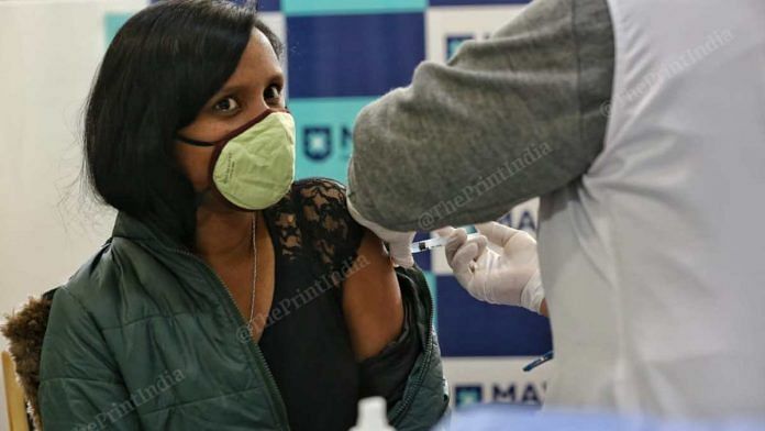 A health worker receives Covid vaccine at Max Hospital in Delhi's Patparganj on 16 January 2021 | Suraj Singh Bisht | ThePrint