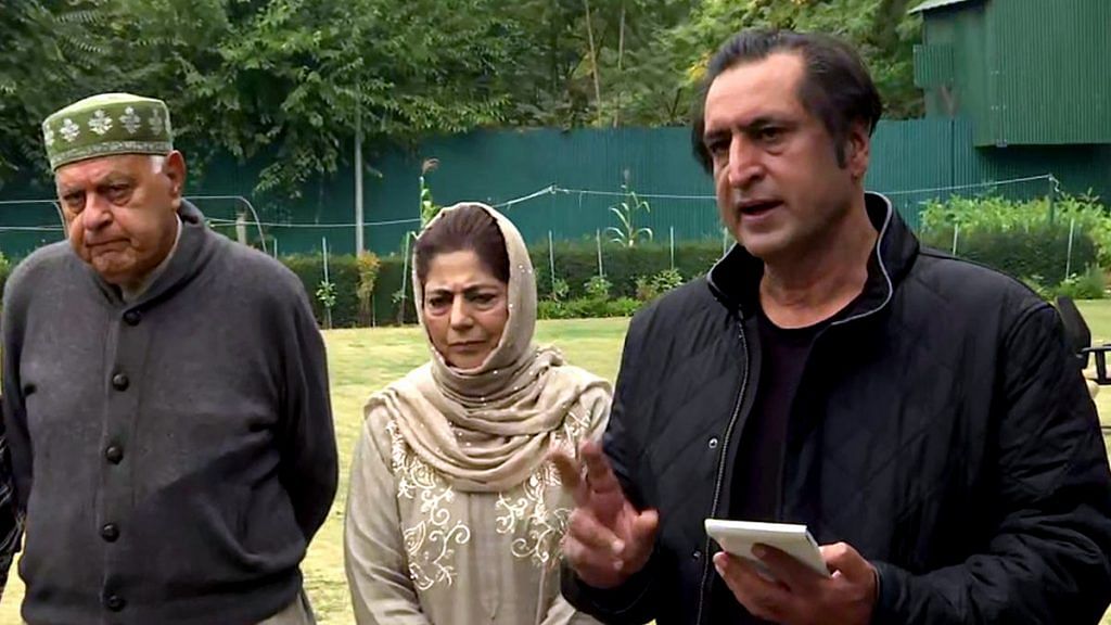 File image of Peoples Conference leader Sajad Lone (R) with Mehbooba Mufti of the PDP and Farooq Abdullah of the NC, who remain a part of the PAGD | ANI