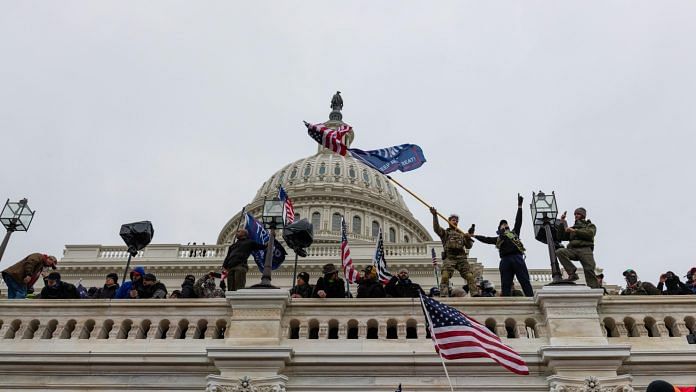 Demonstrators attempt to enter the US Capitol building during a protest in Washington, D.C. on 6 January | Photo Eric Lee | Bloomberg