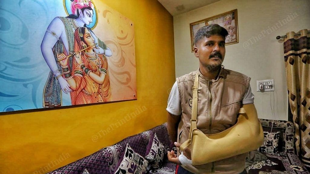 Pranay Sharma, a participant in the Ram Mandir donation drive awareness rally in Ujjain, is recovering from a broken arm | Photo: Praveen Jain | ThePrint