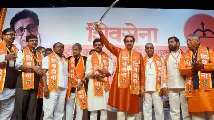 File photo of Maharashtra CM and Shiv Sena president Uddhav Thackeray with party members | PTI