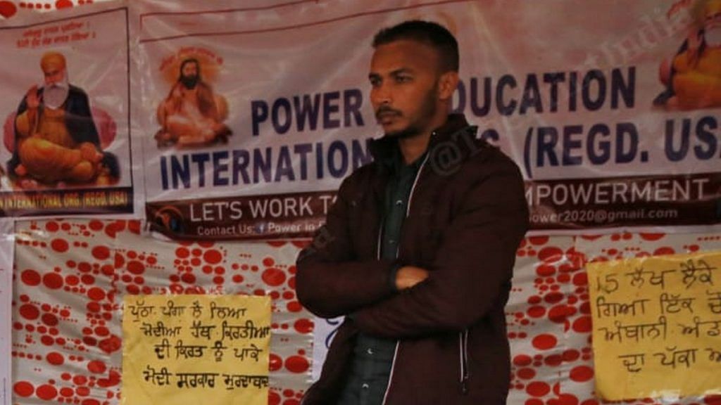 Jalandhar-based activist Naresh Kumar has set up the book stall at Singhu Border | Photo: Manisha Mondal | ThePrint