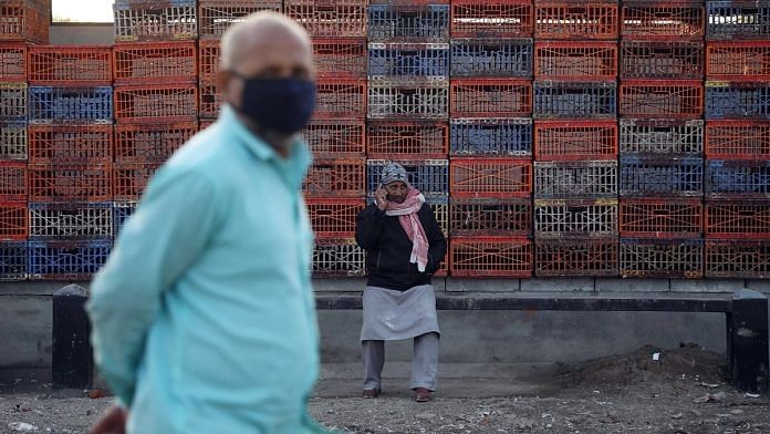 Workers at a wholesale poultry market after it was closed for 10 days as a preventive measure against the spread of bird flu, at Ghazipur in New Delhi Sunday. | Photo: ANI