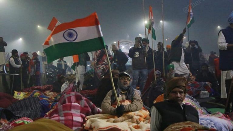 With bonfires & slogans, farmers stay put at Singhu, Ghazipur borders after R-Day violence