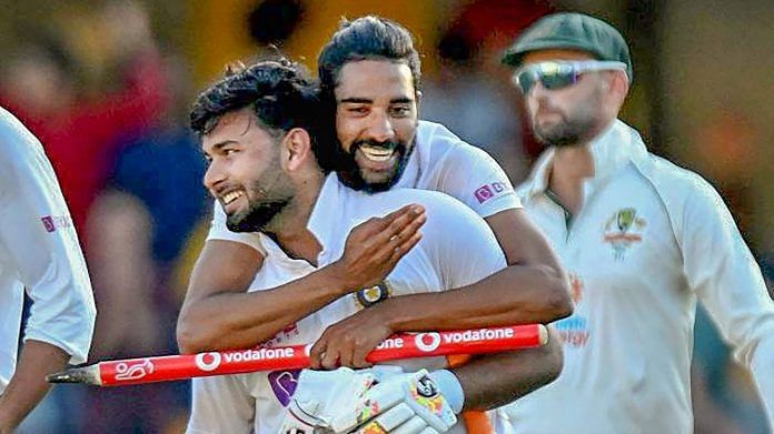 Indian players Shardul Thakur and Mohd Siraj celebrate after defeating Australia by three wickets on the final day of the fourth cricket test match at the Gabba, Brisbane, Australia, Tuesday, Jan. 19, 2021. | PTI
