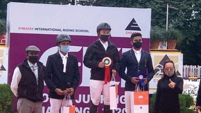 A file photo of Kekhriesilie Rio (centre), who has recently been ranked second in the world (category A) in equestrian show jumping. | Photo: Twitter/Neiphiu Rio