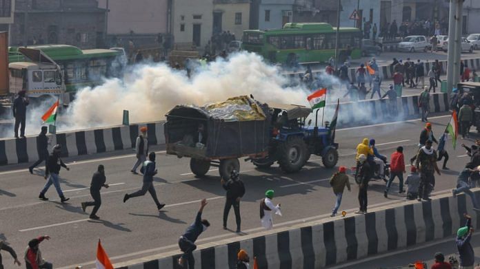 Protesting farmers clashed with police at several places in the national capital after tractor rally turned violent, on 26 January 2021 | Photo: Suraj Bisht Singh | ThePrint
