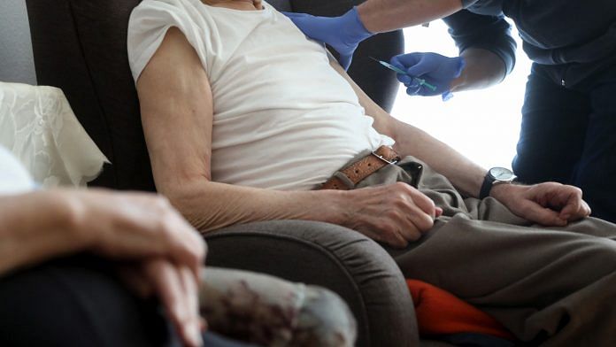 A resident receives a dose of Pfizer-BioNTech Covid vaccine at a senior citizen care home in Premnitz, Germany | Photo: Liesa Johannssen-Koppitz | Bloomberg