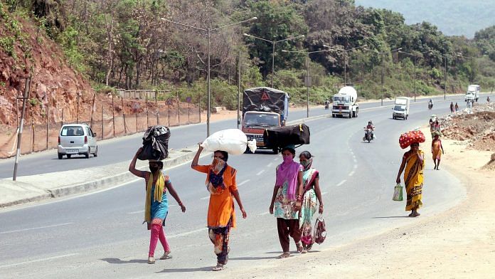 Migrant workers walk along National Highway 8 toward Jalgaon district of Maharashtra in May, 2020 (Representational Image) | ANI