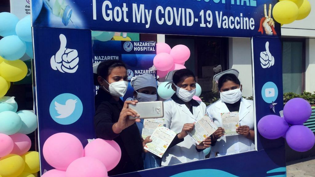Frontline workers click selfies after getting the Covid-19 vaccine, in Prayagraj on 4 February | Representational image | ANI