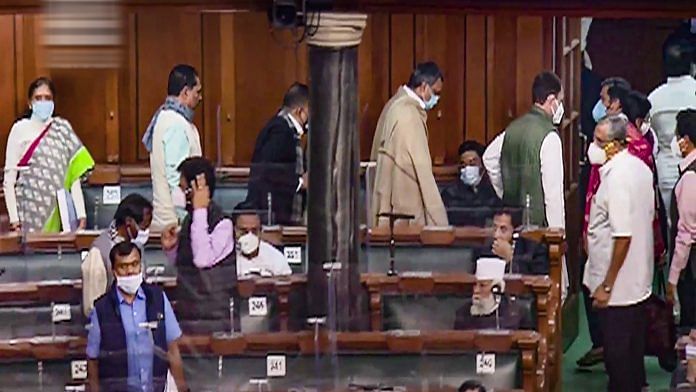 Congress members walk out of the Lok Sabha during the Budget Session of Parliament, in New Delhi, on 10 February 2021 | LSTV/PTI Photo