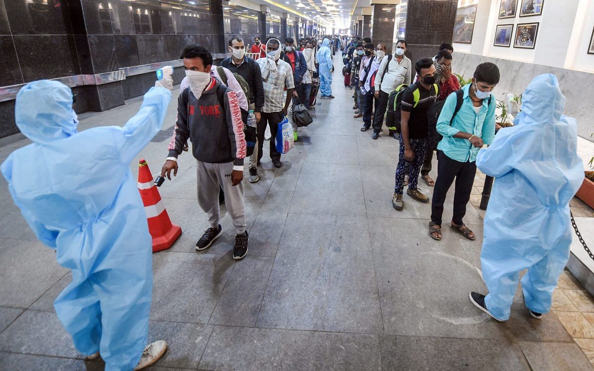 COVID-19: Thermal screening of passengers in Mumbai BMC health workers conduct thermal screening of outstation passengers at Chatrapati Shivaji Maharaj Terminus, in Mumbai, on 18 February 2021| Shashank Parade| PTI