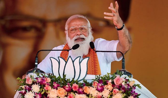 PM Narendra Modi addresses a public meeting ahead of the assembly election in Puducherry, 25 February 2021 | R Senthil Kumar | PTI