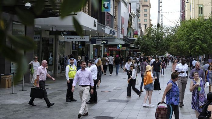 Shoppers and pedestrians walk through Rundle Mall in Adelaide, Australia, 11 February, 2021 | Photographer: James Bugg | Bloomberg