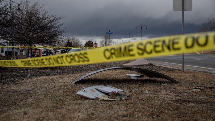 Debris fallen from a United Airlines airplane's engine lay scattered through the neighborhood of Broomfield, outside Denver, Colorado, on 20 February 2021 |