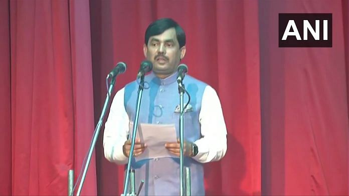 BJP's Shahnawaz Hussain takes oath as a minister in Patna Tuesday | ANI