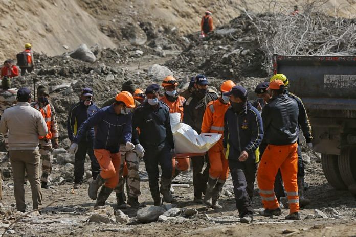Rescue forces recovered seven bodies Sunday at the Rishi Ganga hydel project site near Raini village