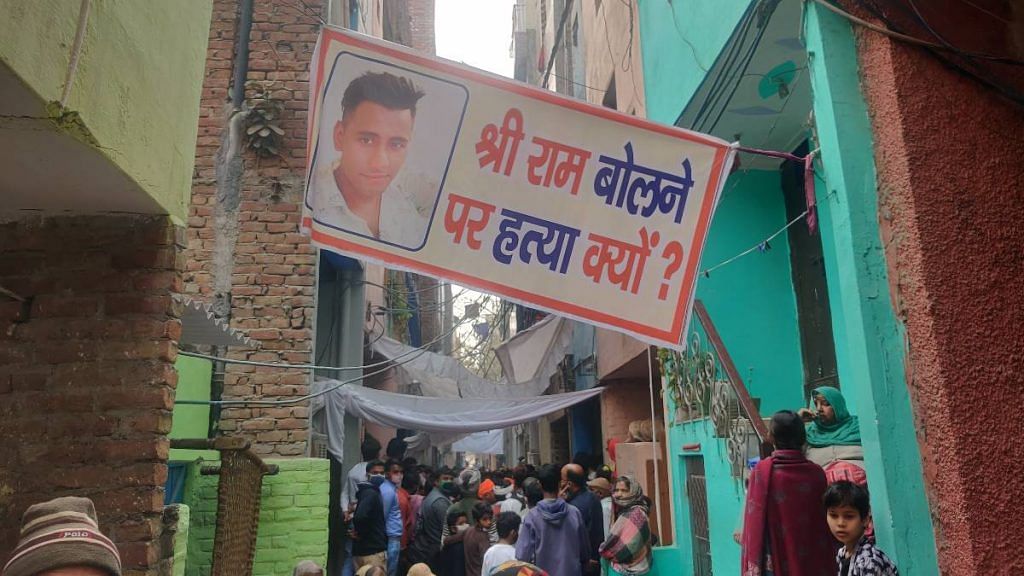 A banner with a photo of Rinku Sharma reads: "Why was he killed for saying Shri Ram?", in Mangolpuri, New Delhi, on 12 February 2021 | Bismee Taskin | ThePrint