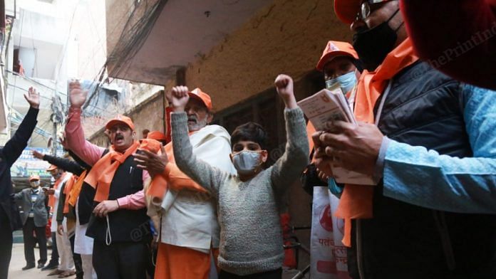 VHP and RSS members at their Ram Mandir donation drive in Naraina, Delhi | Photo: Manisha Mondal/ThePrint.