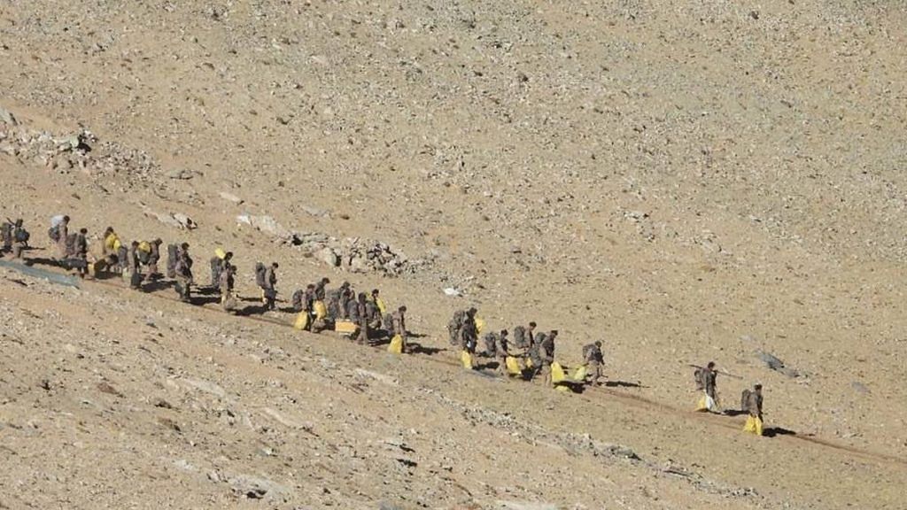 Chinese PLA troops march back from the Pangong Tso area in eastern Ladakh | Photo released by Indian Army