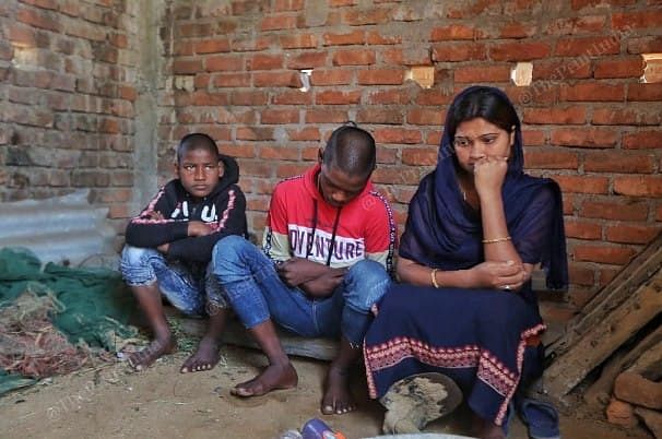 (From left) Rohit, 12, with his older brother Badal Kumar, 16, and their maternal aunt Geeta Devi | Photo: Pravin Jain/ThePrint