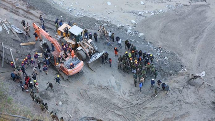 Rescue operations continue at Tapovan Tunnel after a glacier burst in Joshimath which caused a massive flood in the Dhauli Ganga river in Uttarakhand's Chamoli district | ThePrint | Suraj Singh Bisht