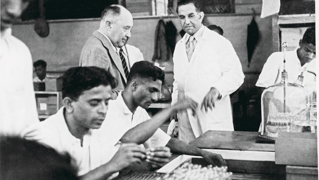Hamid giving a tour of the ampoules department of Cipla in 1941 | © Cipla Limited