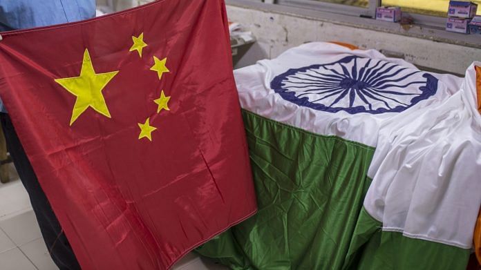 An Indian and Chinese flags at FlagSource workshop in Mumbai | Photo: Dhiraj Singh | Bloomberg