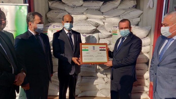 Indian ambassador to Syria Hifzur Rahman presents the rice consignment to Syrian Minister of Local Administration Hussain Makhlouf at Latakia Port on 11 February, 2021 | @eoidamascus | Twitter
