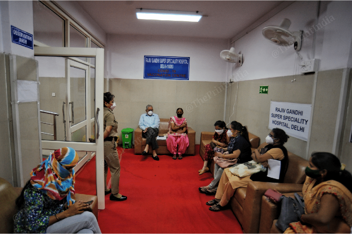 After getting vaccinated, senior citizens wait in the observation area | Photo: Suraj Singh Bisht | ThePrint