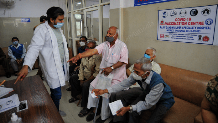 Senior citizens wait for their turn at Rajiv Gandhi hospital | Photo: Suraj Singh Bisht | ThePrint