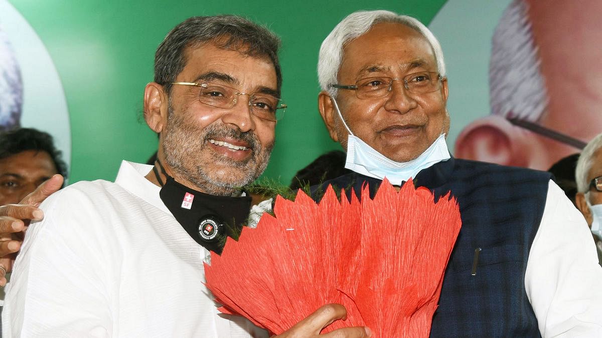Bihar Chief Minister Nitish Kumar greeting RLSP president Upendra Kushwaha after he merged the party with JD(U), Upendra Kushwaha (left) with Nitish Kumar at the merger of his RLSP with the Bihar CM's JD(U) | Photo: ANI