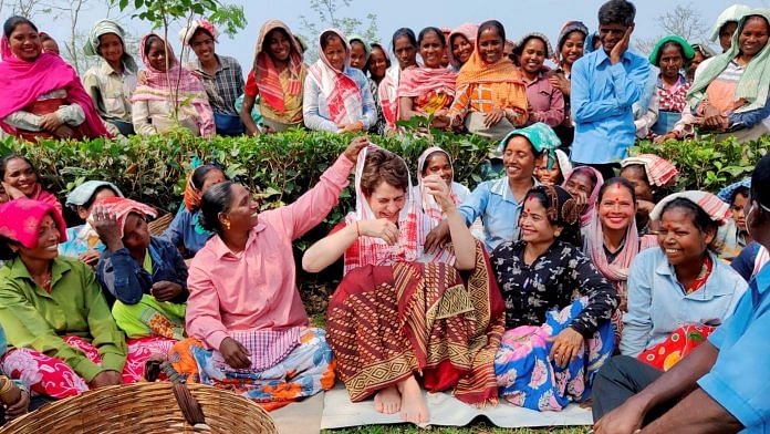 Congress Priyanka Gandhi Vadra with tea workers at Sadhuru tea garden in Biswanath, Assam on 2 March 2021 | PTI Photo