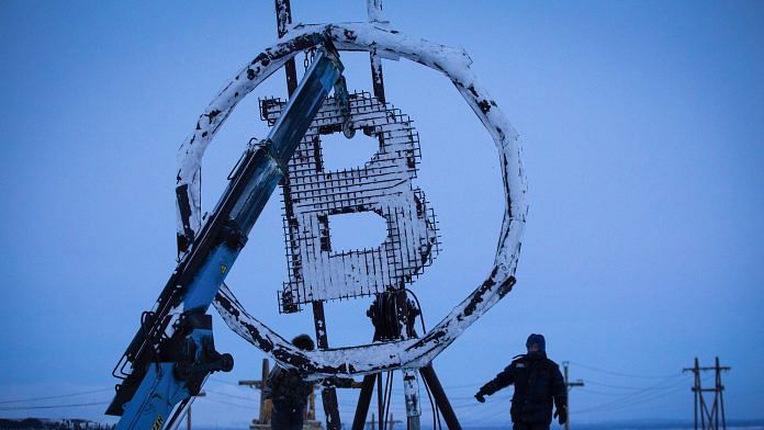 Installation of Bitcoin art object at BitCluster cryptocurrency mining farm in Norilsk, Russia |
