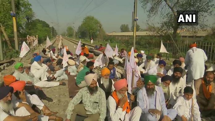 Protestors block railway track in Amritsar as a mark of protest during 'Bharat Bandh' called by Samyukt Kisan Morcha on 26 March, 2021 | Twitter/ANI